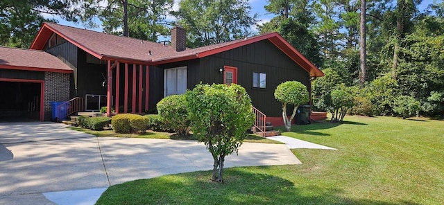 view of front facade with a front lawn and a garage