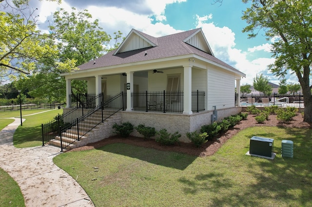 318 Oconee Dr, Midland City, AL 36350 - view of front of house featuring a ceiling fan, board and batten siding, roof with shingles, and brick siding