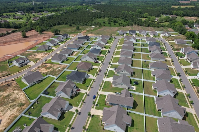 318 Oconee Dr, Midland City, AL 36350 - aerial view of property and surrounding area featuring a heavily wooded area and nearby suburban area