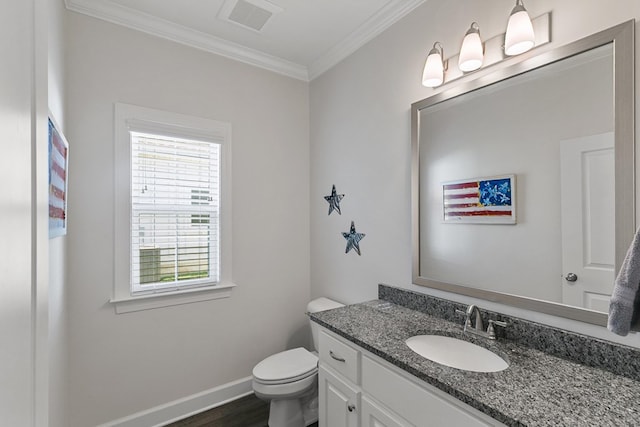318 Oconee Dr, Midland City, AL 36350 - half bathroom featuring ornamental molding, vanity, toilet, baseboards, and wood finished floors