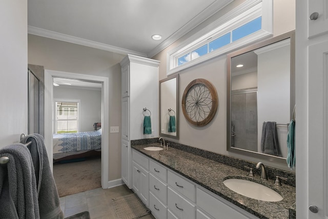 318 Oconee Dr, Midland City, AL 36350 - full bath featuring ornamental molding, a stall shower, double vanity, connected bathroom, and tile patterned flooring