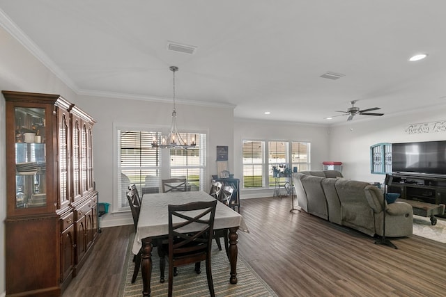 318 Oconee Dr, Midland City, AL 36350 - dining space featuring dark wood-type flooring, crown molding, recessed lighting, a chandelier, and a ceiling fan