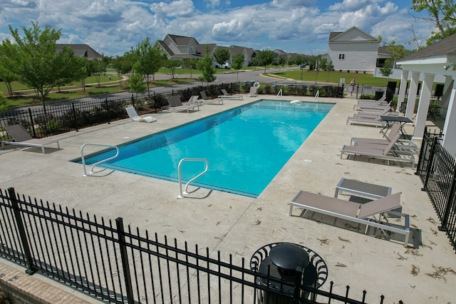 318 Oconee Dr, Midland City, AL 36350 - community pool with a patio area and fence