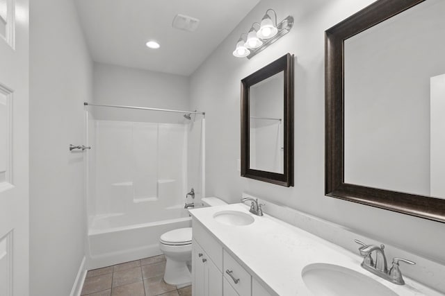 full bathroom featuring vanity, toilet, tile patterned flooring, and shower / bathing tub combination