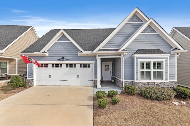 craftsman house with a garage