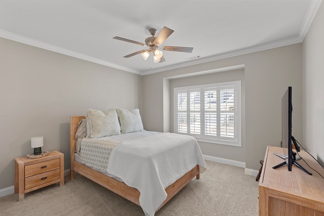 bedroom with ceiling fan, light colored carpet, and crown molding