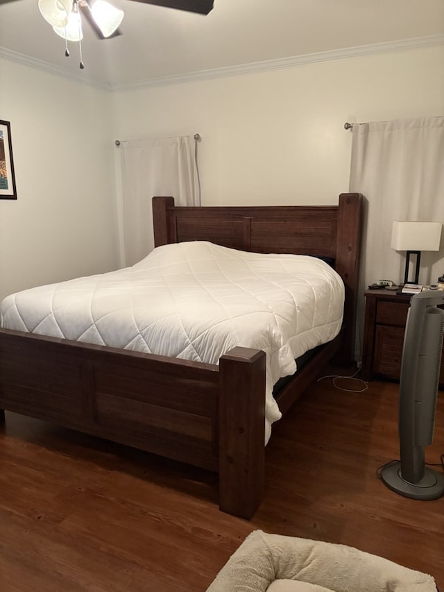 109 Sunshine Ln, Dothan, AL 36303 - bedroom with crown molding, dark wood-style flooring, and ceiling fan