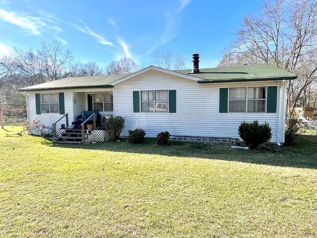 single story home with covered porch and a front yard