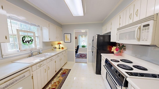 2104 Centenial Dr, Dothan, AL 36303 - kitchen with white appliances, healthy amount of natural light, light flooring, light countertops, and crown molding