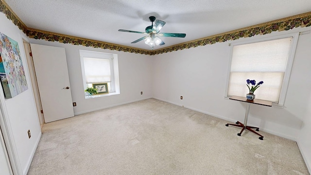 2104 Centenial Dr, Dothan, AL 36303 - carpeted empty room with a ceiling fan and a textured ceiling