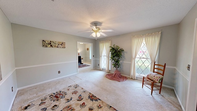 2104 Centenial Dr, Dothan, AL 36303 - living area with carpet, a textured ceiling, and a ceiling fan