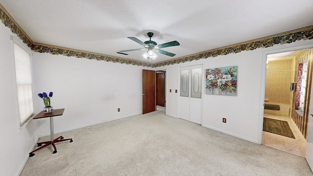 2104 Centenial Dr, Dothan, AL 36303 - unfurnished bedroom with light carpet, a ceiling fan, and ensuite bath