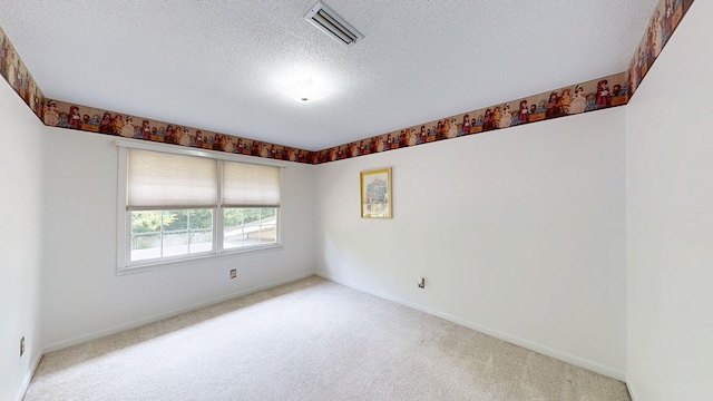 2104 Centenial Dr, Dothan, AL 36303 - carpeted empty room with a textured ceiling and baseboards