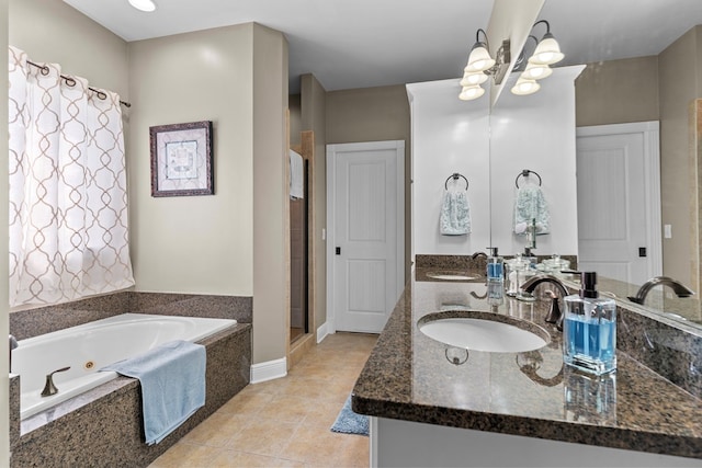 bathroom with tile patterned flooring, vanity, plus walk in shower, and a notable chandelier