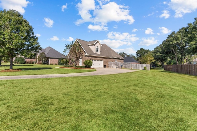 view of front facade featuring a garage and a front yard