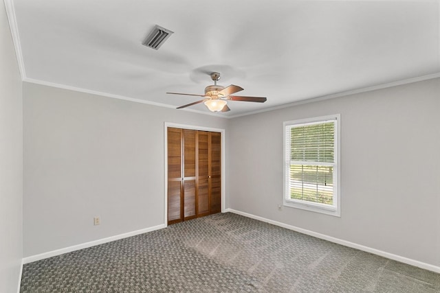 1104 Strathmore Ave, Dothan, AL 36303 - unfurnished bedroom with carpet, ornamental molding, a closet, and ceiling fan