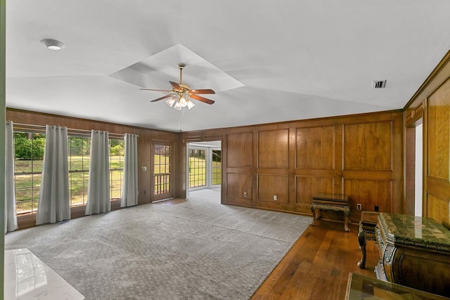 1104 Strathmore Ave, Dothan, AL 36303 - unfurnished living room featuring a ceiling fan, plenty of natural light, vaulted ceiling, and wood finished floors