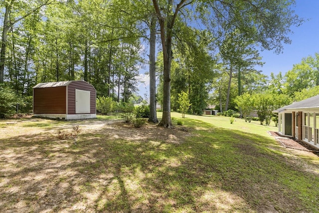 1104 Strathmore Ave, Dothan, AL 36303 - view of grassy yard featuring a shed