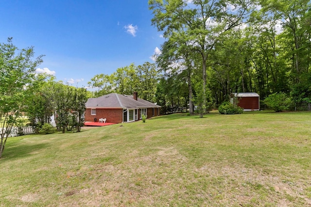 1104 Strathmore Ave, Dothan, AL 36303 - view of grassy yard featuring a storage unit