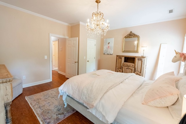 bedroom with dark wood-type flooring, a notable chandelier, and ornamental molding