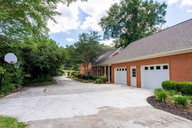 view of property exterior featuring a garage