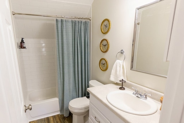 full bathroom with hardwood / wood-style floors, vanity, toilet, and shower / bath combination with curtain