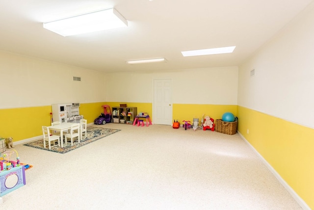 rec room with carpet flooring