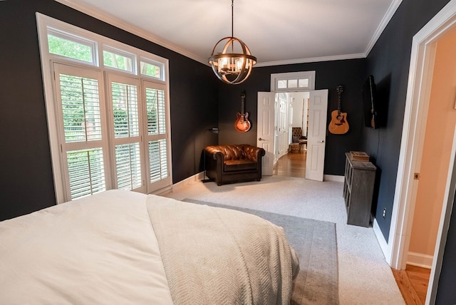 bedroom with crown molding and a chandelier