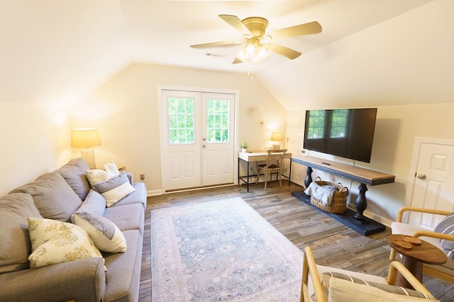 living room with ceiling fan, hardwood / wood-style floors, and lofted ceiling