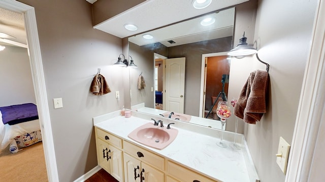 103 Yorkshire St, Dothan, AL 36305 - ensuite bathroom with vanity and baseboards