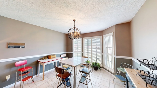 103 Yorkshire St, Dothan, AL 36305 - dining area with a chandelier and a textured ceiling