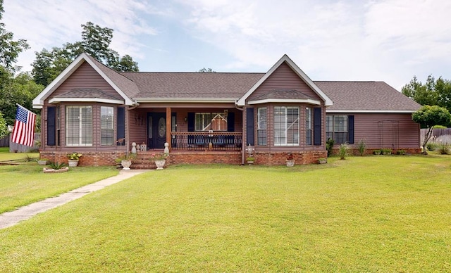 103 Yorkshire St, Dothan, AL 36305 - ranch-style house featuring a porch, a front yard, and roof with shingles