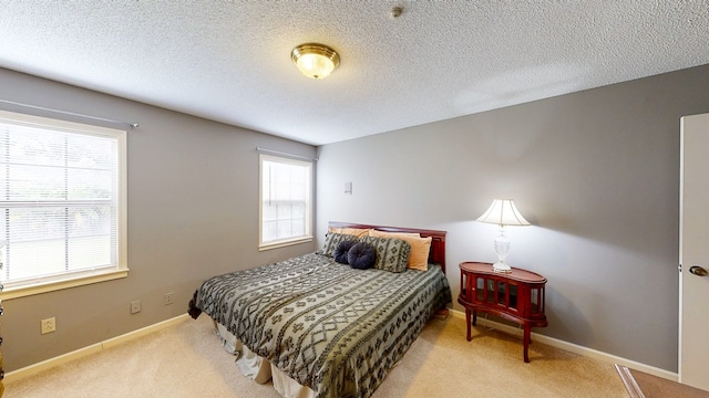 103 Yorkshire St, Dothan, AL 36305 - carpeted bedroom featuring a textured ceiling