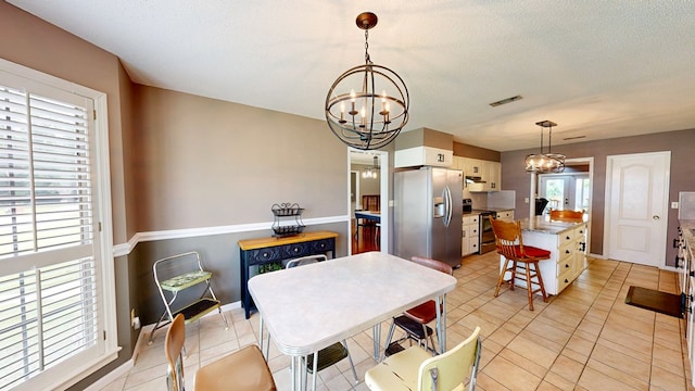 103 Yorkshire St, Dothan, AL 36305 - dining area featuring a chandelier and light tile patterned floors