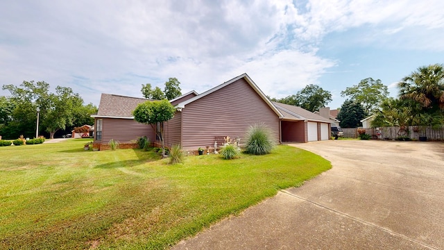 103 Yorkshire St, Dothan, AL 36305 - view of side of home featuring an attached garage and concrete driveway