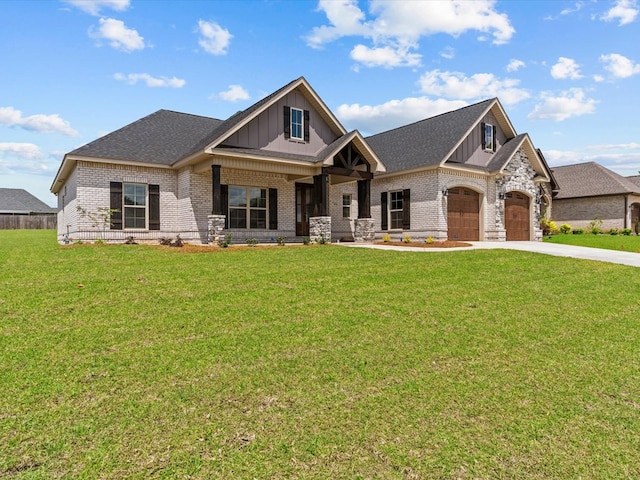 craftsman-style house with board and batten siding, brick siding, driveway, and a front lawn