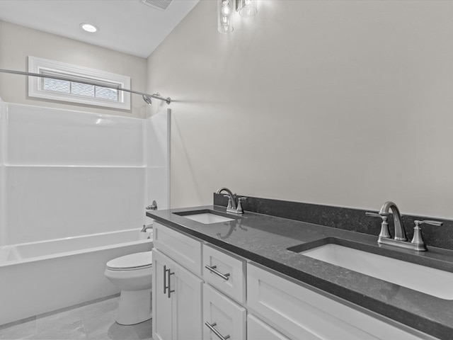 full bath with toilet, shower / washtub combination, and double vanity