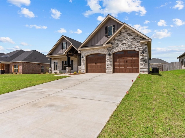 view of front of home with board and batten siding, driveway, brick siding, an attached garage, and central air condition unit