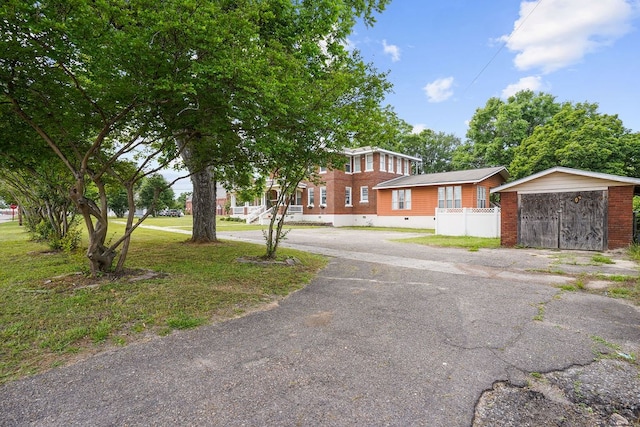 307 S Academy St, Geneva, AL 36340 - view of front of home featuring asphalt driveway