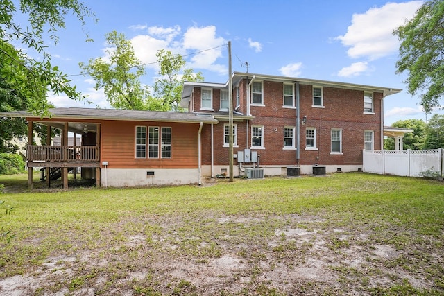 307 S Academy St, Geneva, AL 36340 - back of property featuring central AC unit and brick siding