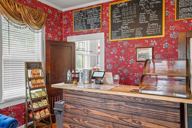 307 S Academy St, Geneva, AL 36340 - indoor dry bar with wallpapered walls, healthy amount of natural light, and crown molding