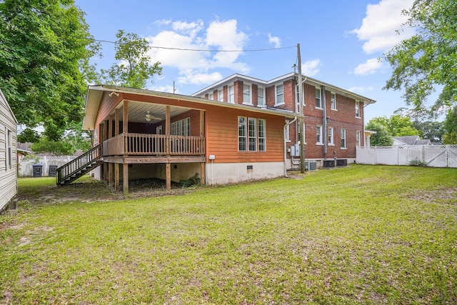 307 S Academy St, Geneva, AL 36340 - back of property with ceiling fan, brick siding, stairway, and central AC unit