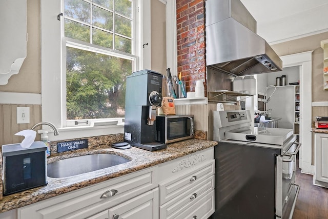 307 S Academy St, Geneva, AL 36340 - kitchen featuring exhaust hood, range with electric cooktop, white cabinetry, light stone counters, and dark wood-style flooring