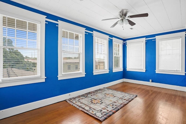 307 S Academy St, Geneva, AL 36340 - unfurnished room featuring a ceiling fan, wood-type flooring, baseboards, and ornamental molding