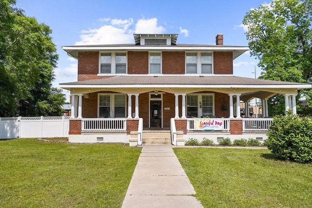 307 S Academy St, Geneva, AL 36340 - american foursquare style home with a chimney, brick siding, and a porch