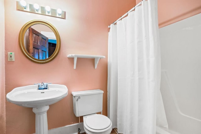 307 S Academy St, Geneva, AL 36340 - full bathroom with toilet and curtained shower