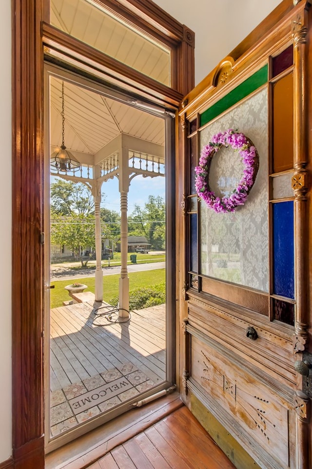 doorway to outside with hardwood / wood-style flooring