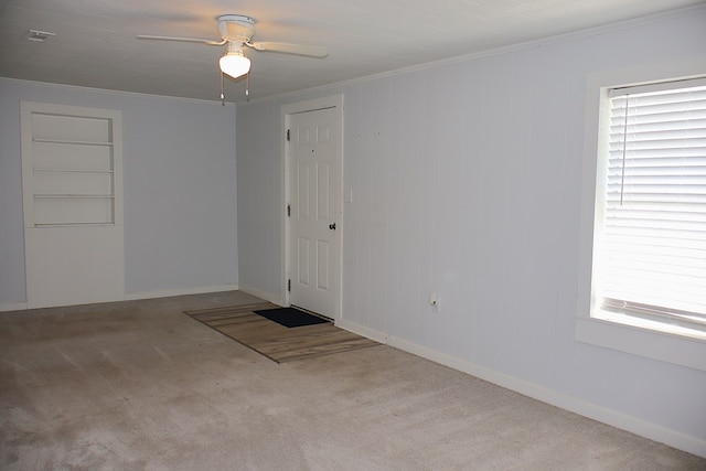 907 E Lee St, Enterprise, AL 36330 - carpeted spare room featuring ceiling fan, ornamental molding, and baseboards