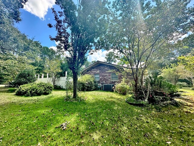 view of yard featuring central AC