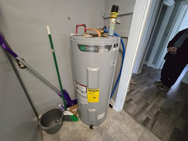 utility room with water heater